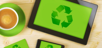 A tablet and smartphone with recycle icon on their screens