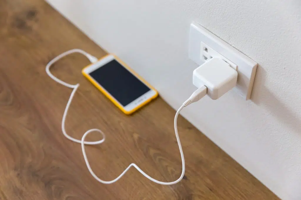 a phone plugged into the wall