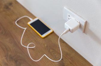 phone plugged into wall charging