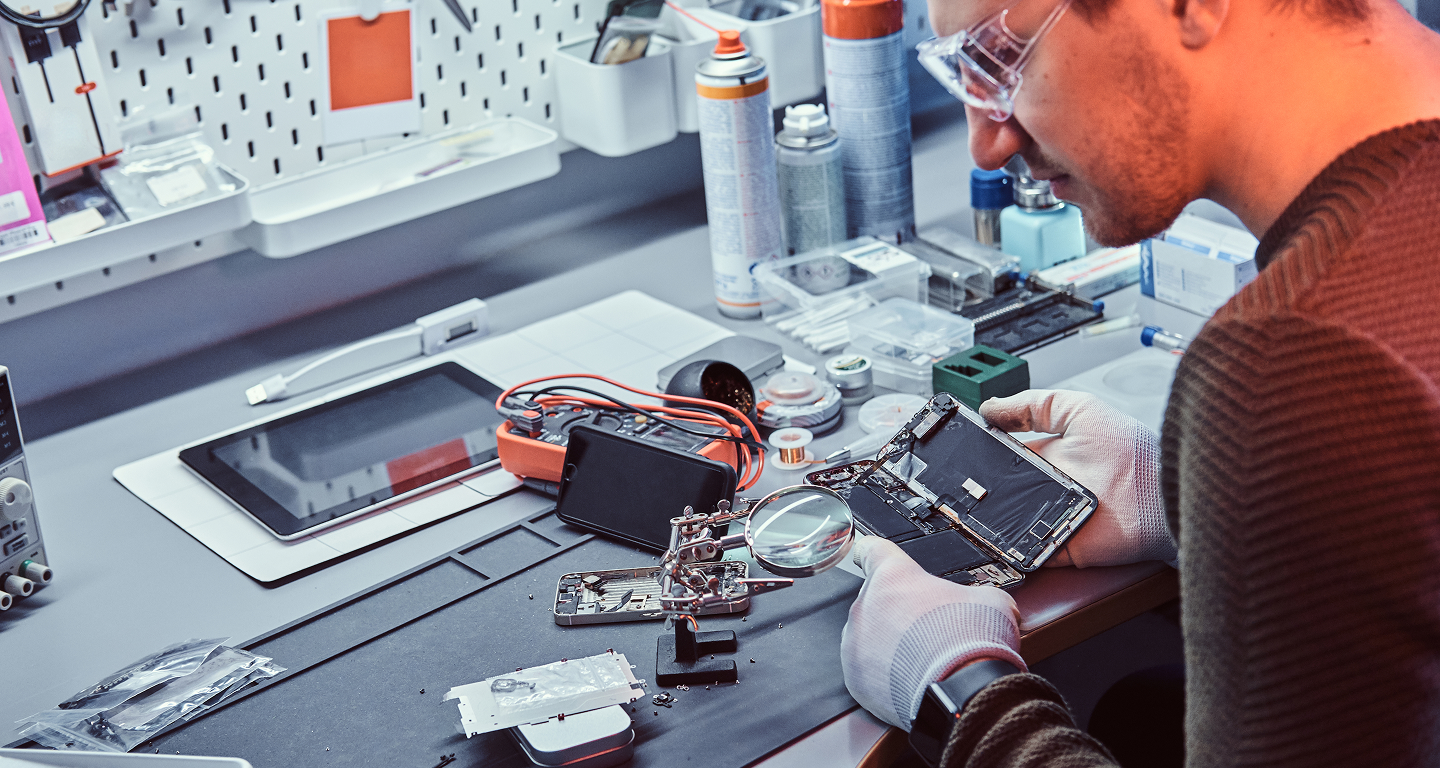 guy fixing cellphone
