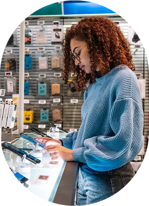 http://girl%20visiting%20store%20checking%20phones