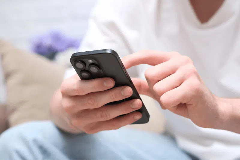 Person using their iPhone 15