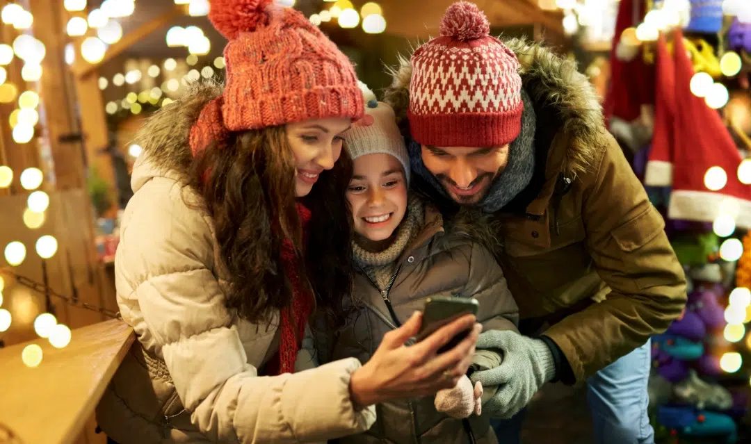 Family looking at phone