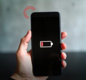 Person holding a phone with the battery running out